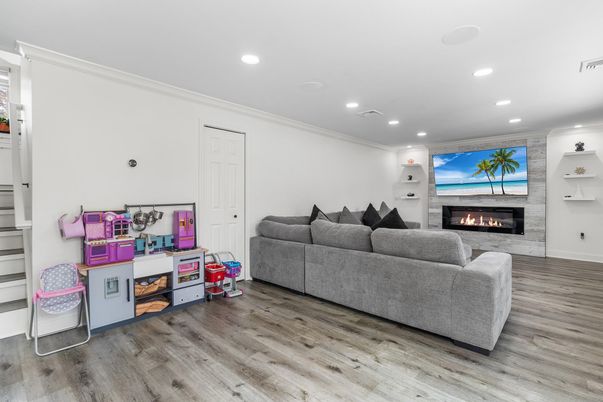 Fireplace, Interior, Living room, Recessed Lighting, Wood Texture Flooring
