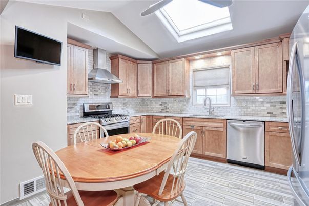 Dining room, Glass Ceilings, Interior, Kitchen, Recessed Lighting, Stainless Steel Appliances, Wood Texture Flooring