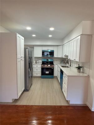 Interior, Kitchen, Recessed Lighting, Stainless Steel Appliances, Wood Texture Flooring