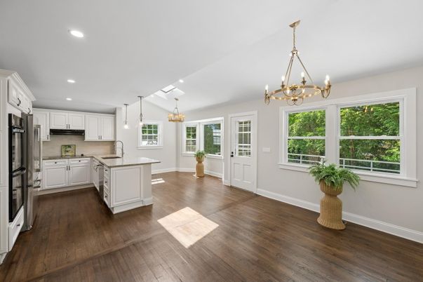 Chandelier, Interior, Kitchen, Pendant Lights, Recessed Lighting, Stainless Steel Appliances, Wood Texture Flooring