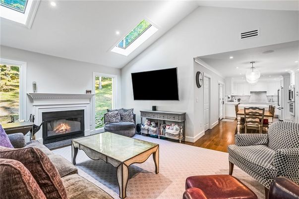 Dining room, Fireplace, Interior, Kitchen, Living room, Pendant Lights, Recessed Lighting, Stainless Steel Appliances, Wood Texture Flooring