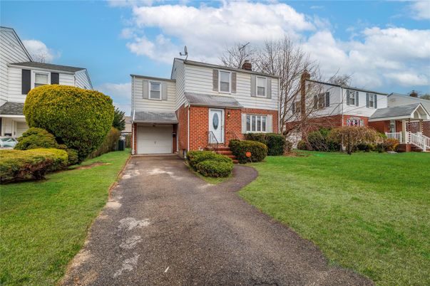 Attached, Exterior, Facade, Brick Facade, Raised Ranch