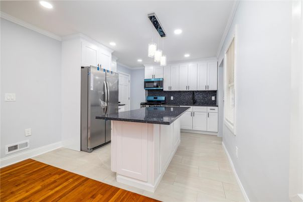 Interior, Kitchen, Pendant Lights, Recessed Lighting, Stainless Steel Appliances, Wood Texture Flooring