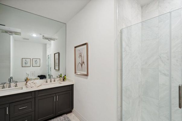 Bathroom, Dual Sink Vanities, Glass Shower, Interior, Marble Walls, Recessed Lighting