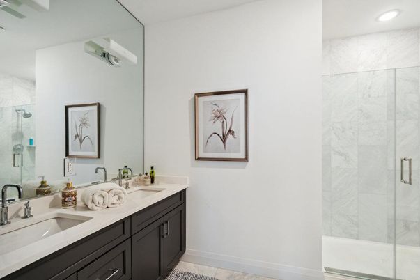 Bathroom, Dual Sink Vanities, Glass Shower, Interior, Marble Walls, Recessed Lighting