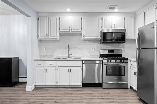 Interior, Kitchen, Recessed Lighting, Stainless Steel Appliances, Wood Texture Flooring