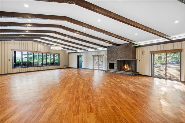 Empty room, Fireplace, Interior, Recessed Lighting, Wooden Beams, Wood Texture Flooring