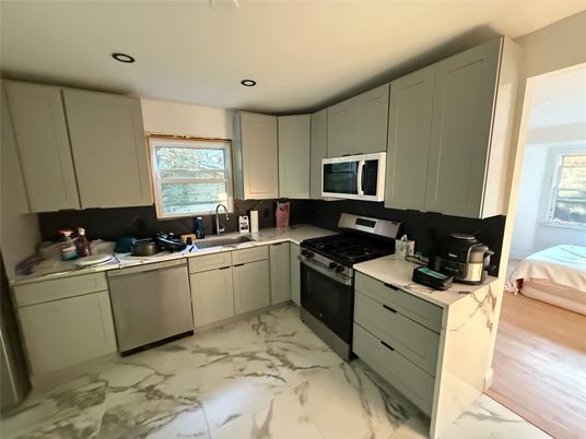 Interior, Kitchen, Marble, Recessed Lighting, Stainless Steel Appliances, Wood Texture Flooring