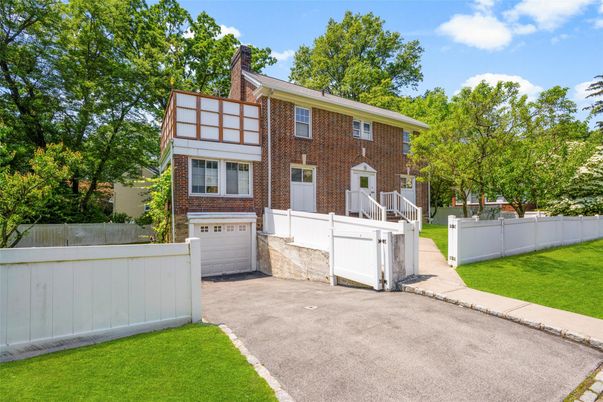Attached, Exterior, Facade, Brick Facade, Tudor Revival