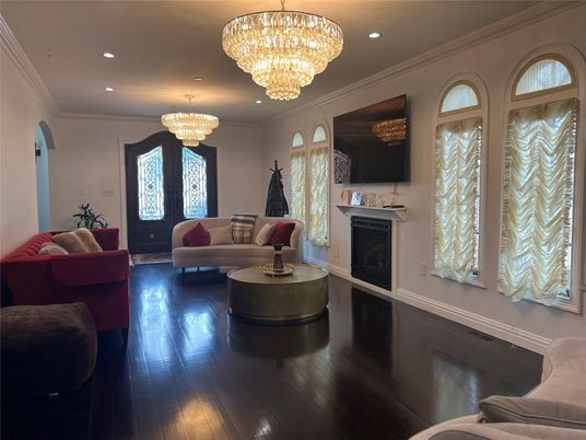 Chandelier, Fireplace, Interior, Living room, Recessed Lighting, Wood Texture Flooring