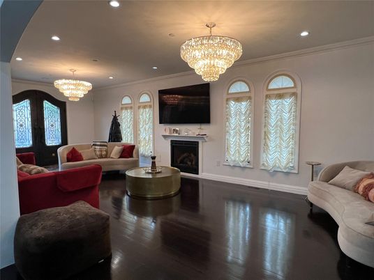 Chandelier, Fireplace, Interior, Living room, Recessed Lighting, Wood Texture Flooring