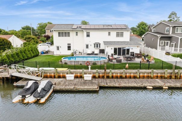 Exterior, Pool, Solar Panels