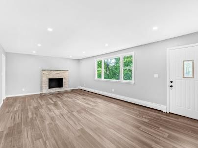 Empty room, Fireplace, Interior, Recessed Lighting, Wood Texture Flooring