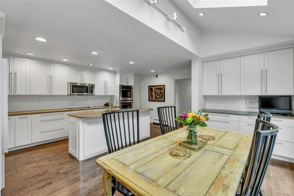 Dining room, Interior, Kitchen, Recessed Lighting, Stainless Steel Appliances, Wood Texture Flooring