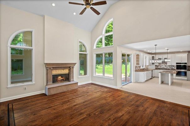 Fireplace, Interior, Kitchen, Pendant Lights, Recessed Lighting, Stainless Steel Appliances, Wood Texture Flooring