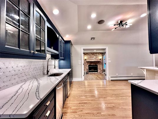 Fireplace, Interior, Kitchen, Recessed Lighting, Wood Texture Flooring