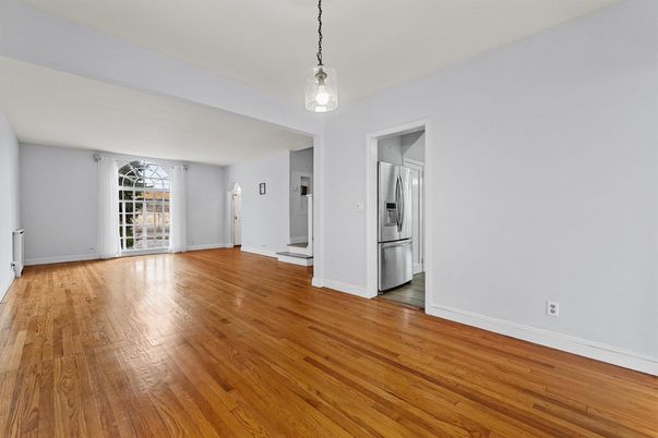 Empty room, Interior, Kitchen, Pendant Lights, Stainless Steel Appliances, Wood Texture Flooring