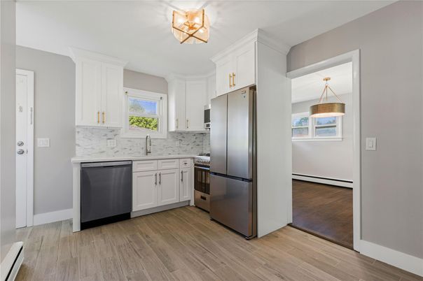 Interior, Kitchen, Marble Walls, Stainless Steel Appliances, Wood Texture Flooring