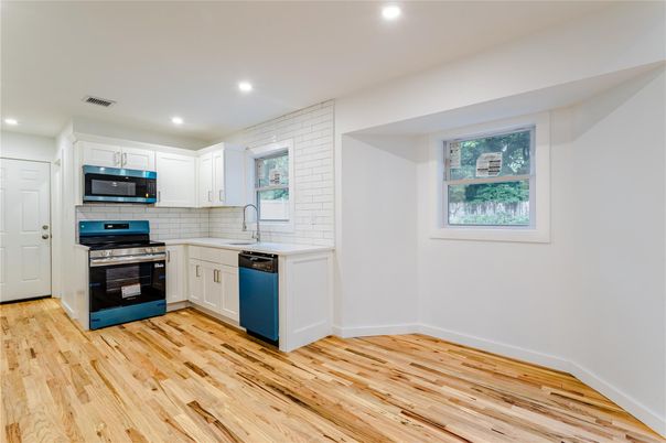 Interior, Kitchen, Recessed Lighting, Stainless Steel Appliances, Wood Texture Flooring
