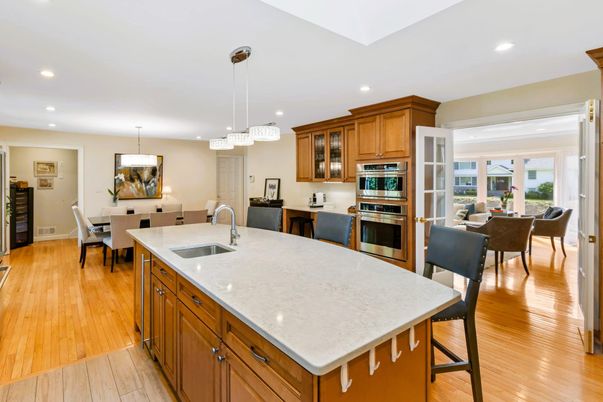 Chandelier, Dining room, Interior, Kitchen, Pendant Lights, Recessed Lighting, Stainless Steel Appliances, Wood Texture Flooring