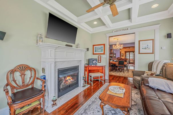 Chandelier, Dining room, Fireplace, Interior, Living room, Recessed Lighting, Wood Texture Flooring