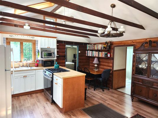 Chandelier, Dining room, Interior, Kitchen, Stainless Steel Appliances, Wooden Beams, Wood Texture Flooring