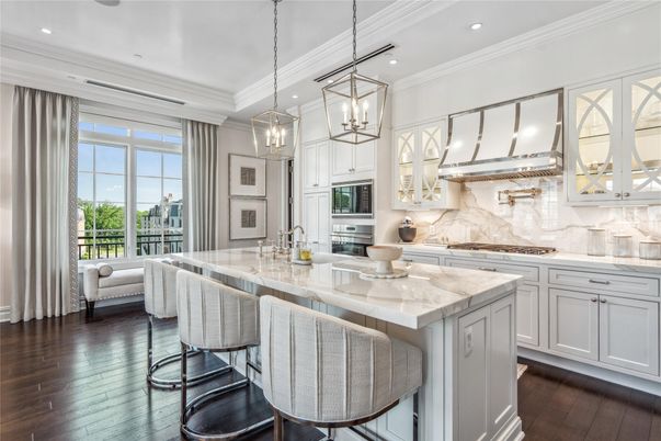 Interior, Kitchen, Marble Walls, Pendant Lights, Recessed Lighting, Stainless Steel Appliances, Wood Texture Flooring