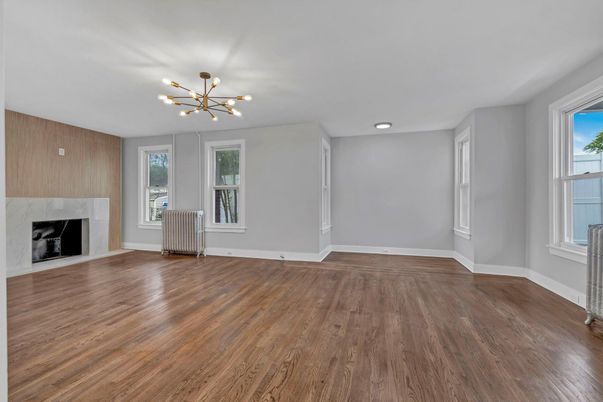 Empty room, Fireplace, Interior, Pendant Lights, Recessed Lighting, Wood Texture Flooring, Wooden Walls