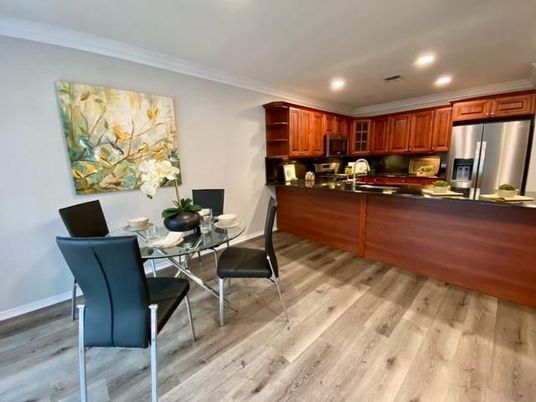 Dining room, Interior, Kitchen, Recessed Lighting, Stainless Steel Appliances, Wood Texture Flooring