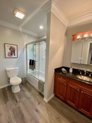 Bathroom, Glass Shower, Interior, Recessed Lighting, Wood Texture Flooring