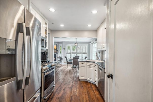 Dining room, Interior, Kitchen, Pendant Lights, Recessed Lighting, Stainless Steel Appliances, Wood Texture Flooring