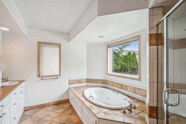 Bathroom, Dual Sink Vanities, Glass Shower, Interior, Recessed Lighting, Tile Countertops