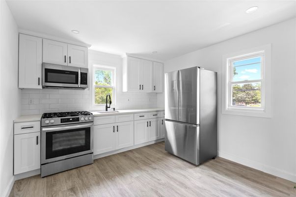 Interior, Kitchen, Recessed Lighting, Stainless Steel Appliances, Wood Texture Flooring