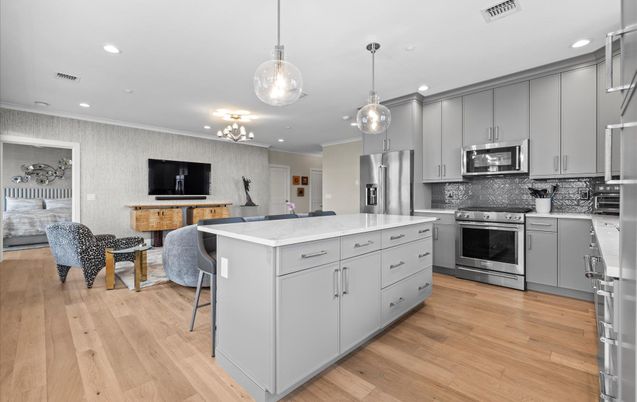 Interior, Kitchen, Pendant Lights, Recessed Lighting, Stainless Steel Appliances, Wood Texture Flooring