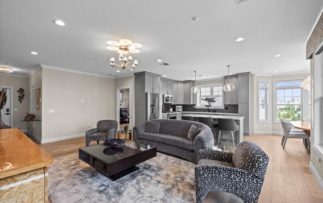 Dining room, Interior, Kitchen, Living room, Pendant Lights, Recessed Lighting, Stainless Steel Appliances, Wood Texture Flooring