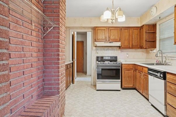 Interior, Kitchen, Pendant Lights, Stainless Steel Appliances, Stone Walls