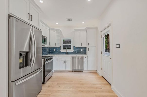 Interior, Kitchen, Recessed Lighting, Stainless Steel Appliances, Wood Texture Flooring