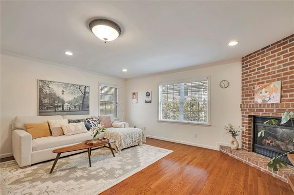Fireplace, Interior, Living room, Recessed Lighting, Stone Walls, Wood Texture Flooring