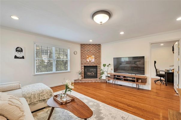 Fireplace, Home Office, Interior, Living room, Recessed Lighting, Stone Walls, Wood Texture Flooring