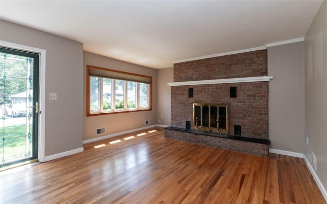 Empty room, Fireplace, Interior, Stone Walls, Wood Texture Flooring