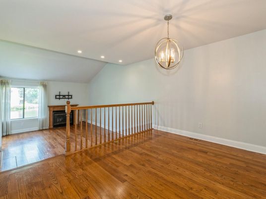 Empty room, Fireplace, Interior, Pendant Lights, Recessed Lighting, Wood Texture Flooring