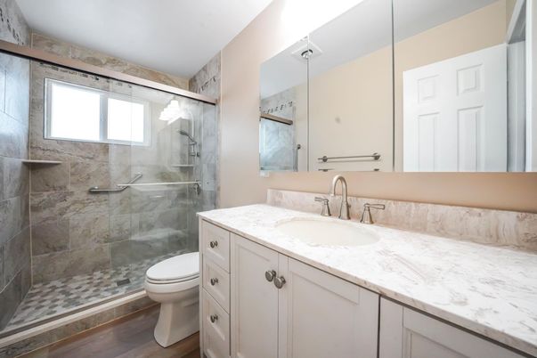 Bathroom, Glass Shower, Interior, Marble Walls, Wood Texture Flooring