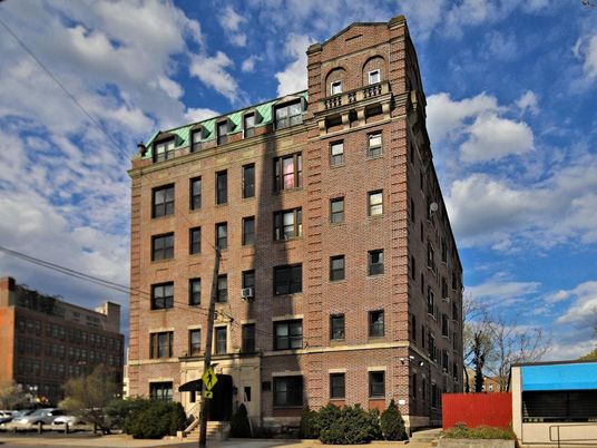 Exterior, Facade, Brick Facade, Condo Building