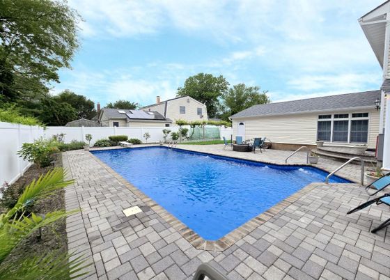 Exterior, Pool, Solar Panels