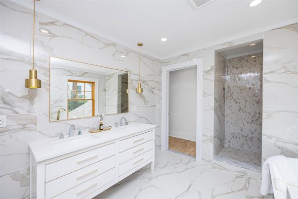 Bathroom, Dual Sink Vanities, Glass Shower, Interior, Marble, Marble Walls, Recessed Lighting