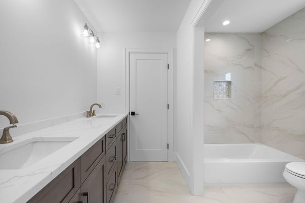 Bathroom, Dual Sink Vanities, Interior, Marble, Marble Walls, Recessed Lighting