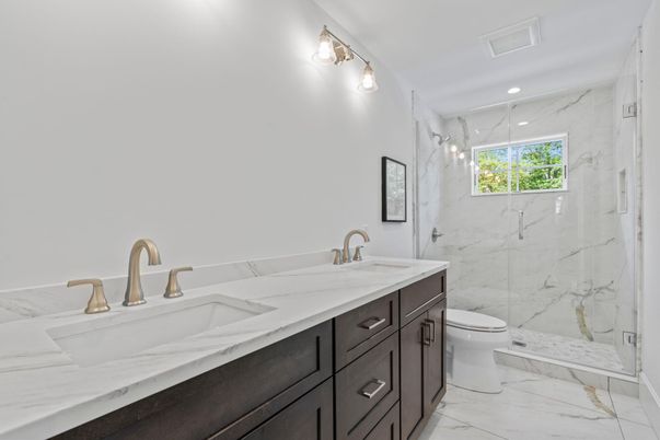 Bathroom, Dual Sink Vanities, Glass Shower, Interior, Marble, Marble Walls, Recessed Lighting