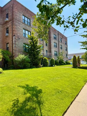 Backyard, Exterior, Facade, Brick Facade, Condo Building