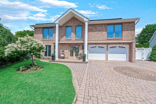 Attached, Exterior, Facade, Brick Facade, Solar Panels, Brick Traditional