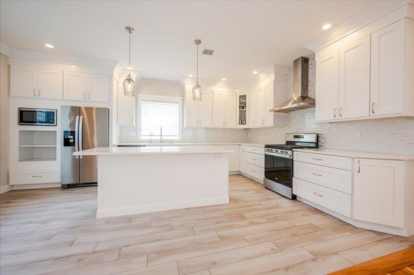 Interior, Kitchen, Pendant Lights, Recessed Lighting, Stainless Steel Appliances, Wood Texture Flooring